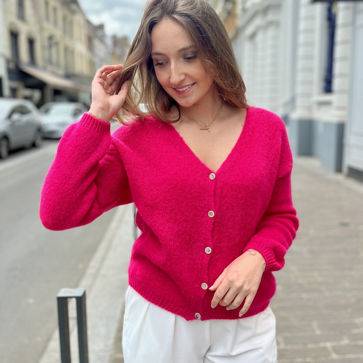 Gilet ajouré et boutons FRAMBOISE