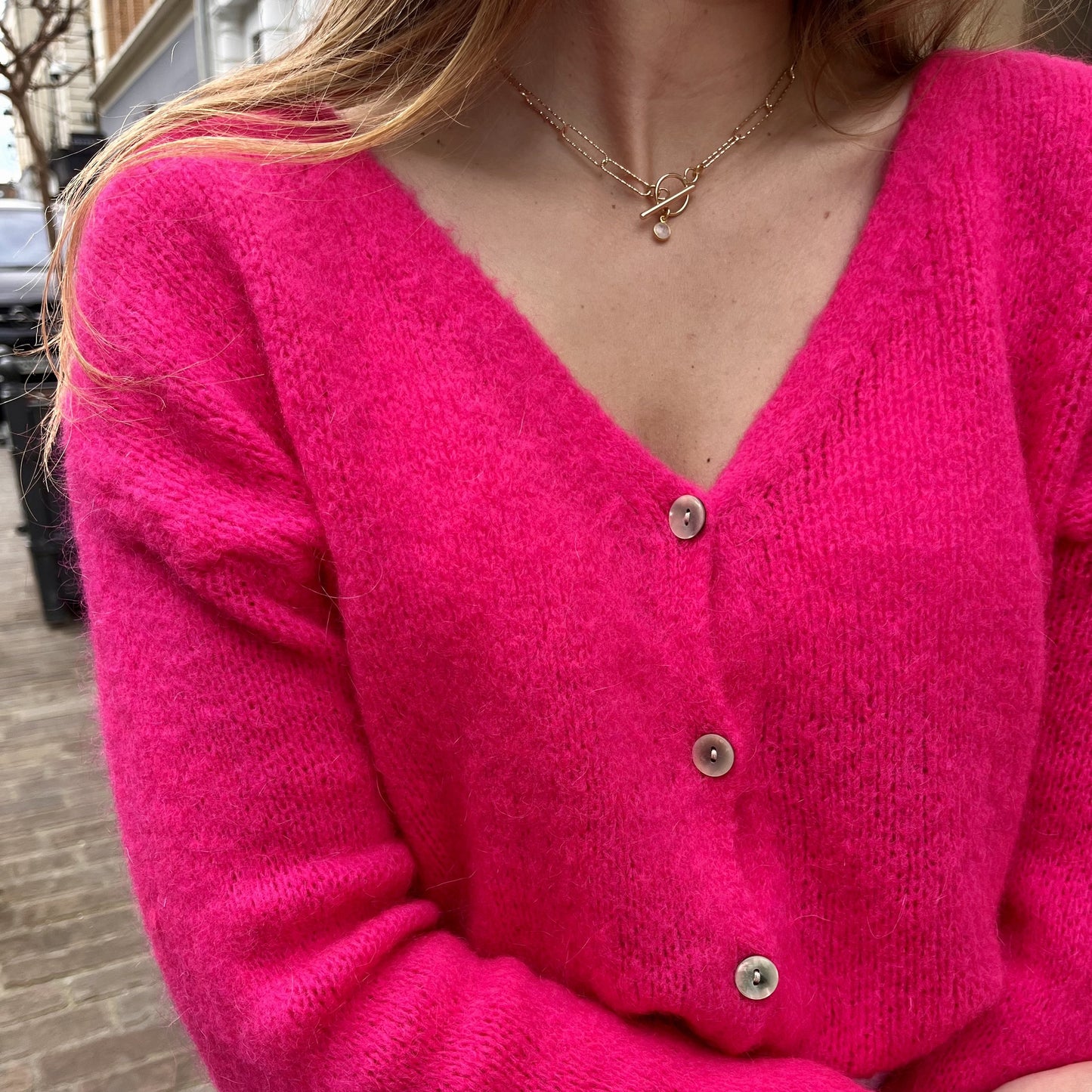 Gilet ajouré et boutons FRAMBOISE