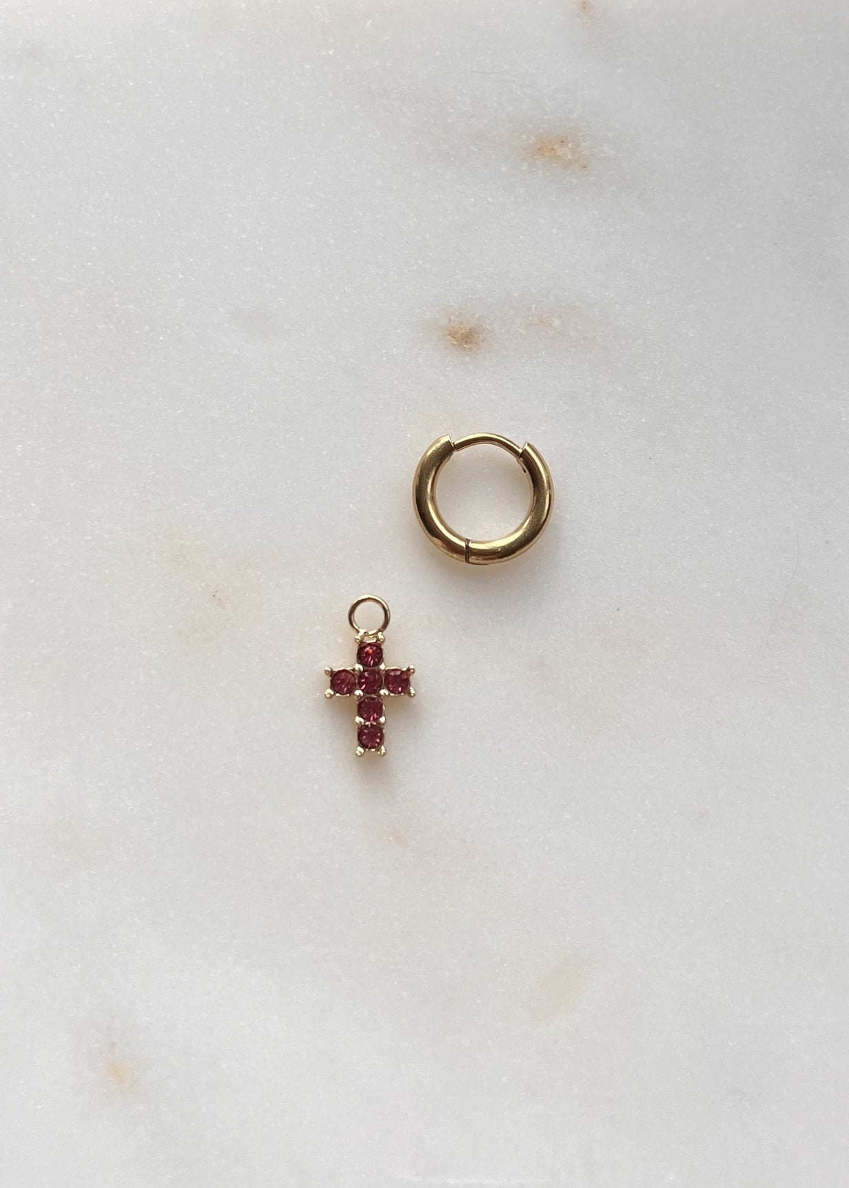Piercing croix stressée ROSE