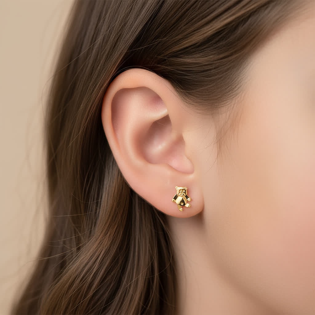 Puces ourson plaqué or