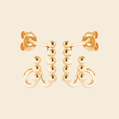 Boucles plaqué or - perles sculptées 