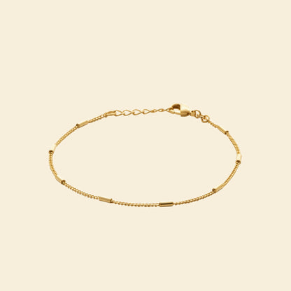 Bracelet plaqué or perlé - finesse et éclat discret 