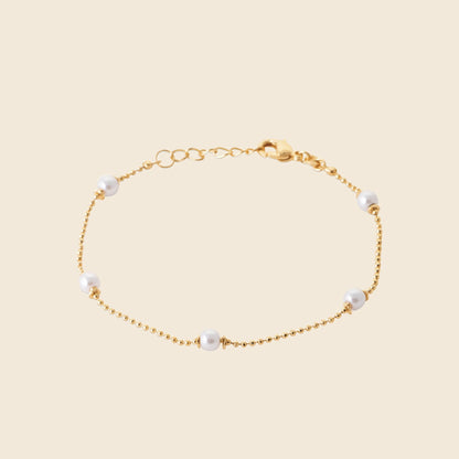 Bracelet plaqué or - perles blanches 