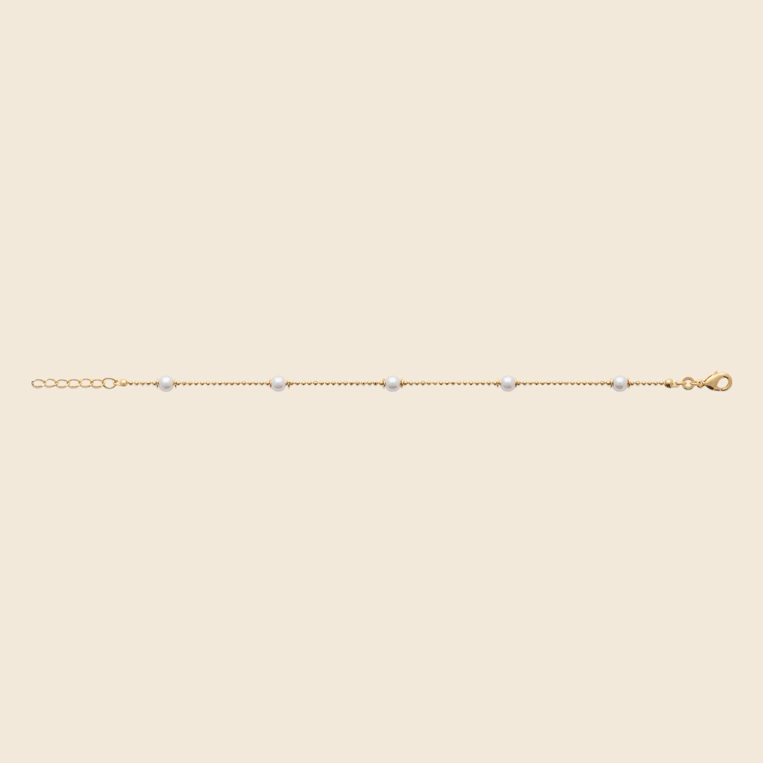 Bracelet plaqué or - perles blanches 