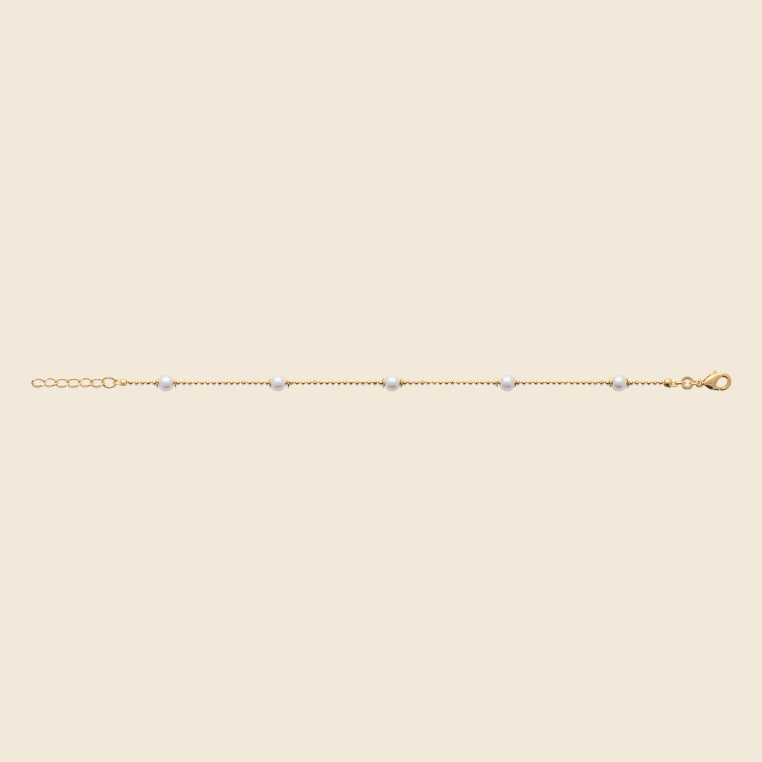 Bracelet plaqué or - perles blanches 