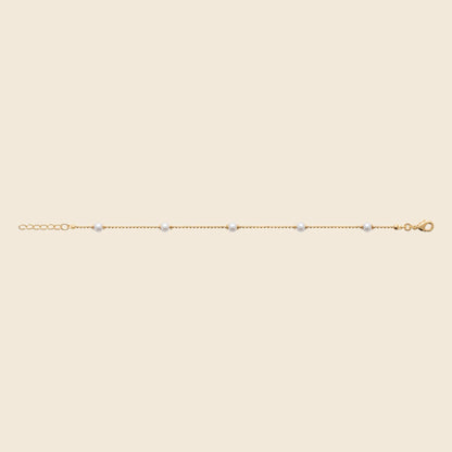 Bracelet plaqué or - perles blanches 