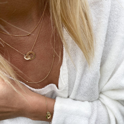 Collier anneaux enlacés &amp; plaqué or 