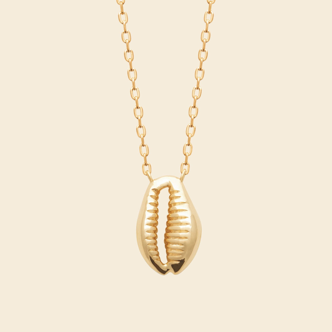 Collier cauri plaqué or 