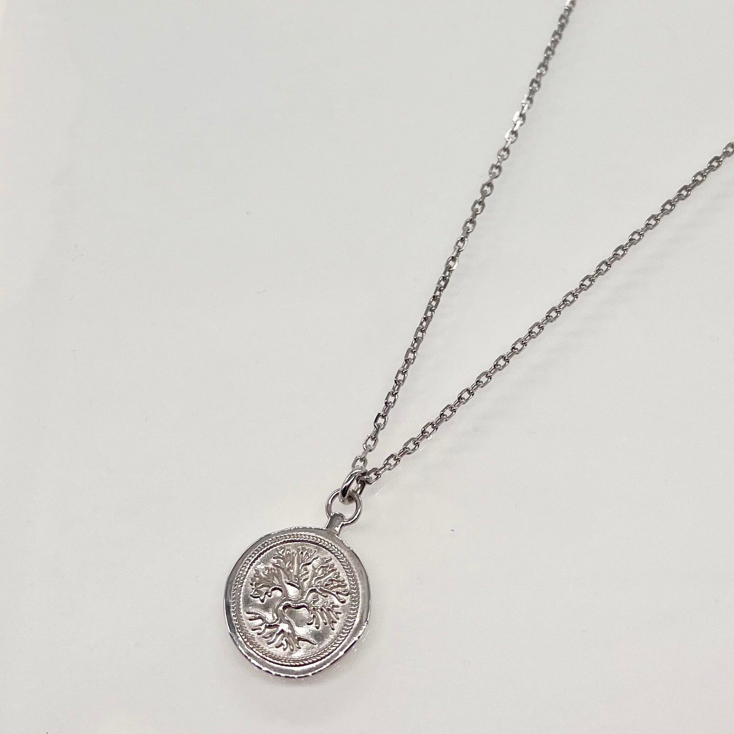 Collier racine argent 