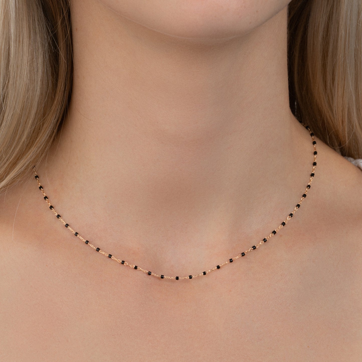Collier soleil plaqué or & email noir 