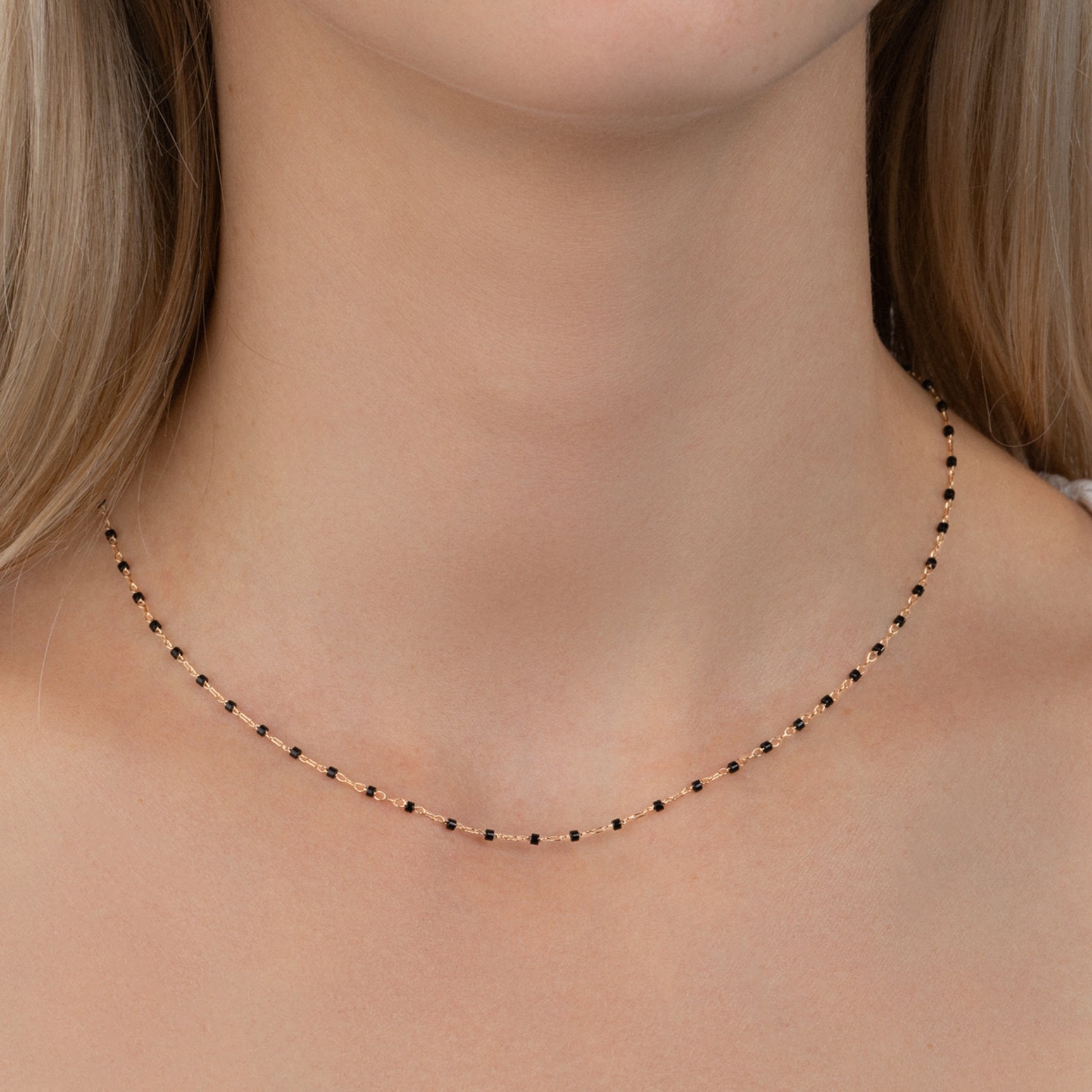 Collier soleil plaqué or & email noir 