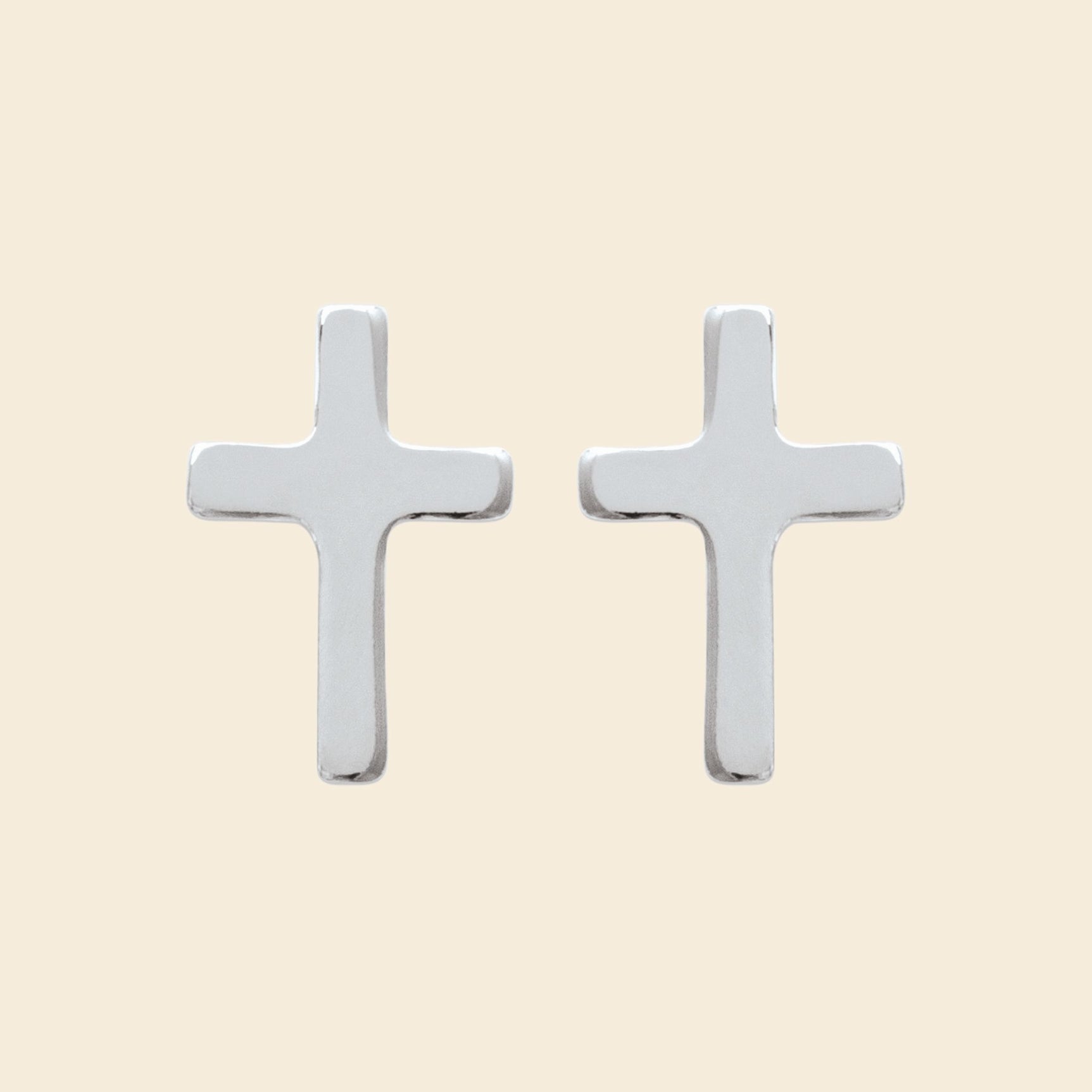 Puces croix argent 